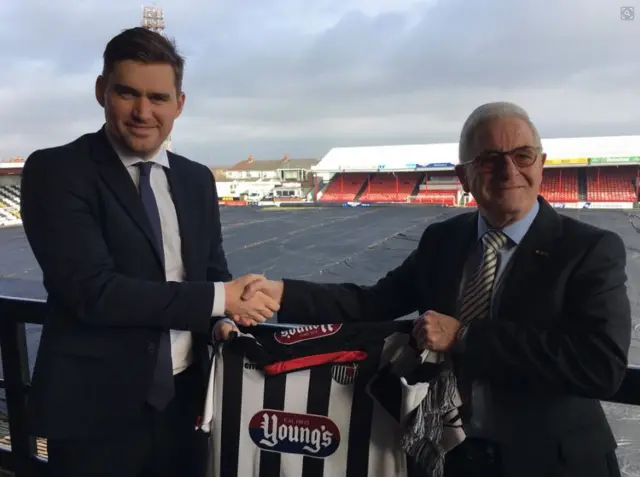 New Grimsby Town boss Michael Jolley with director Philip Day.