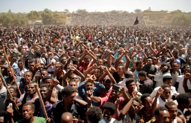 Supporters of Bekele Gerba, secretary general of the Oromo Federalist Congress (OFC), chant slogans to celebrate Gerba"s release from prison, in Adama, Oromia Region