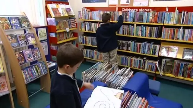 A child reading at a library