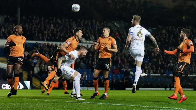 Liam Cooper wins a header for Leeds