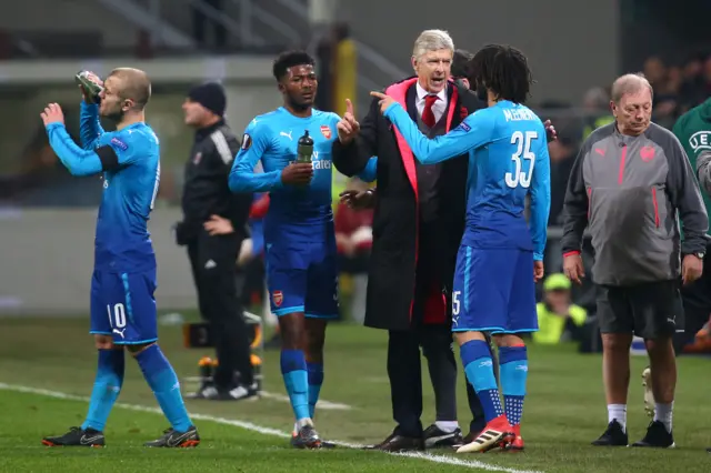 Arsene Wenger with Mohamed Elneny