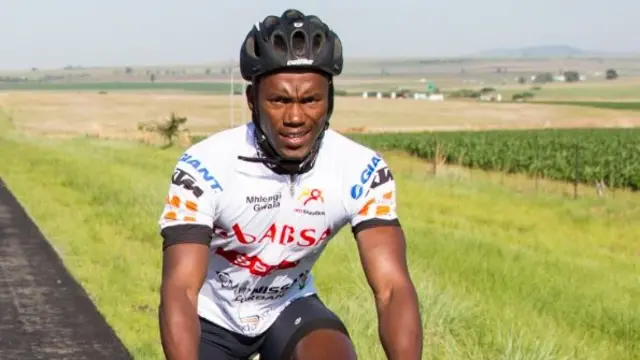 Triathlete Mhlengi Gwala on his bike