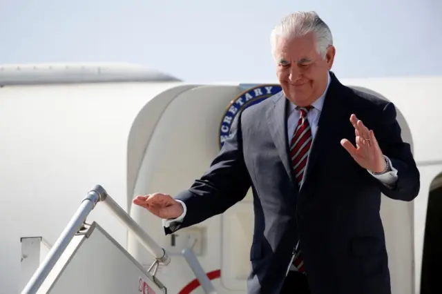 US Secretary of State Rex Tillerson waves at Djibouti airport