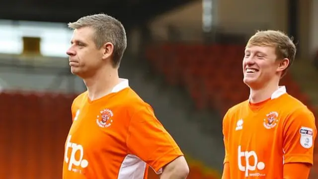 Kevin Stuart and Blackpool player