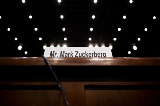 Zuckerberg's placard is seen at the witness table in the US Senate