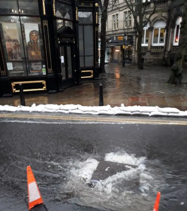 Flooding sewer outside Harrogate's Pump House Museum