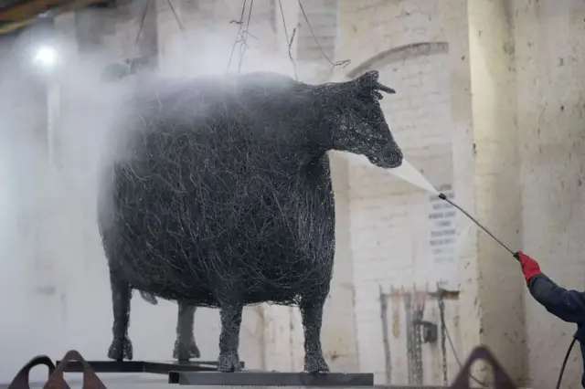 Heifer sculpture being galvanised