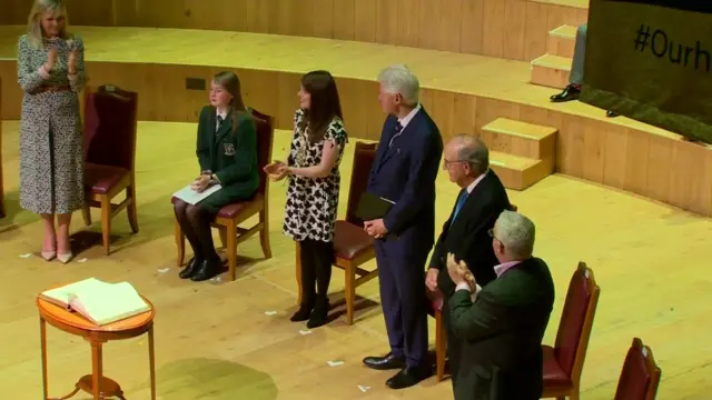 Bill Clinton and George Mitchell at the Ulster Hall