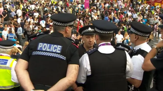 Police with a crowd