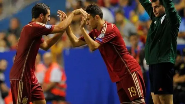 The moment that Munir El Haddadi (right) came onto the pitch to replace Koke for Spain against Macedonia in 2014