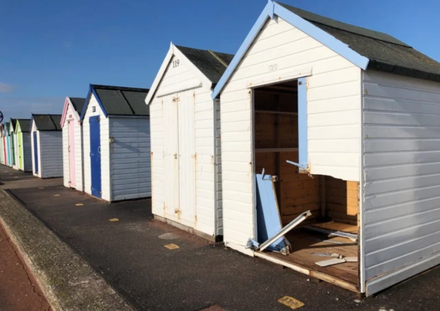 vandalised beach hut