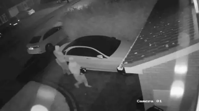 Thieves stealing car on CCTV