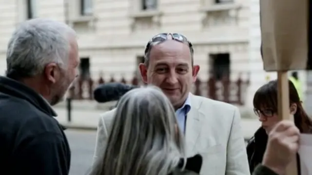 Simon Delow at a protest