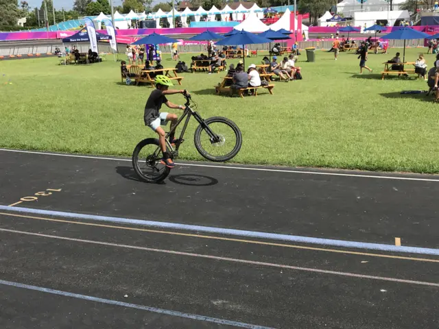 Kid does a wheelie