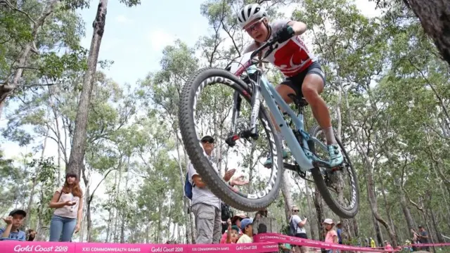 Evie Richards competing on her mountain bike