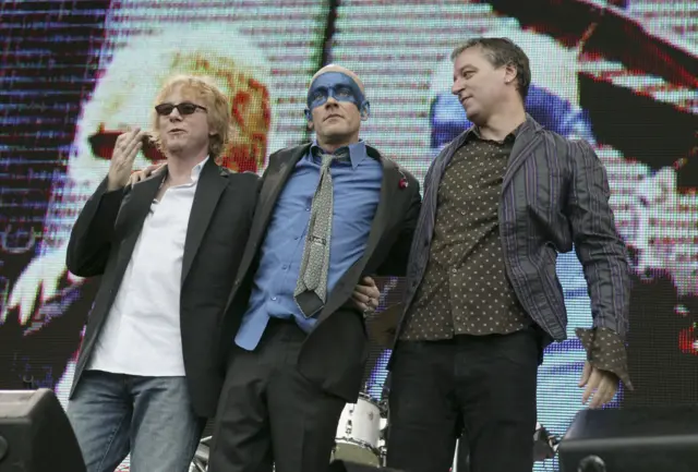 Peter Buck (right) with REM