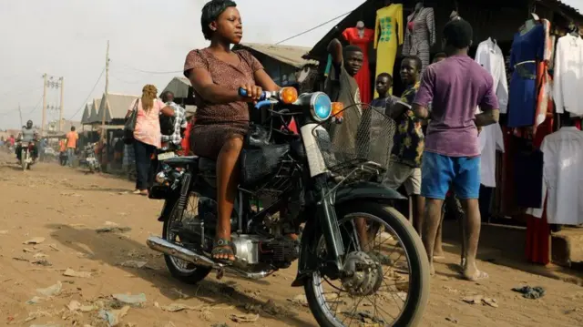 Woman riding a motorcycle