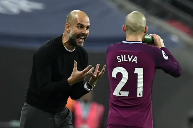 Pep Guardiola and David Silva