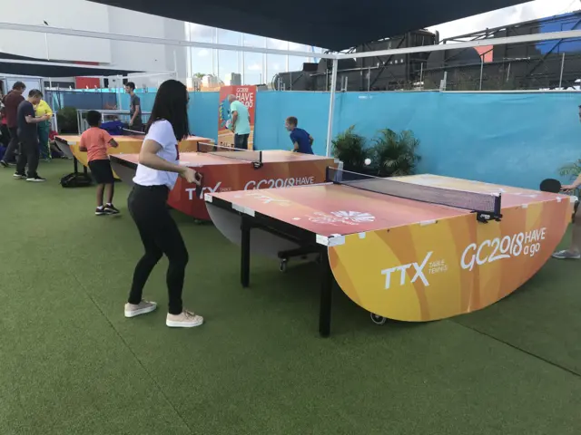 Table tennis being played