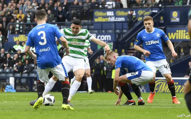 Celtic midfielder Tom Rogic scores against Rangers