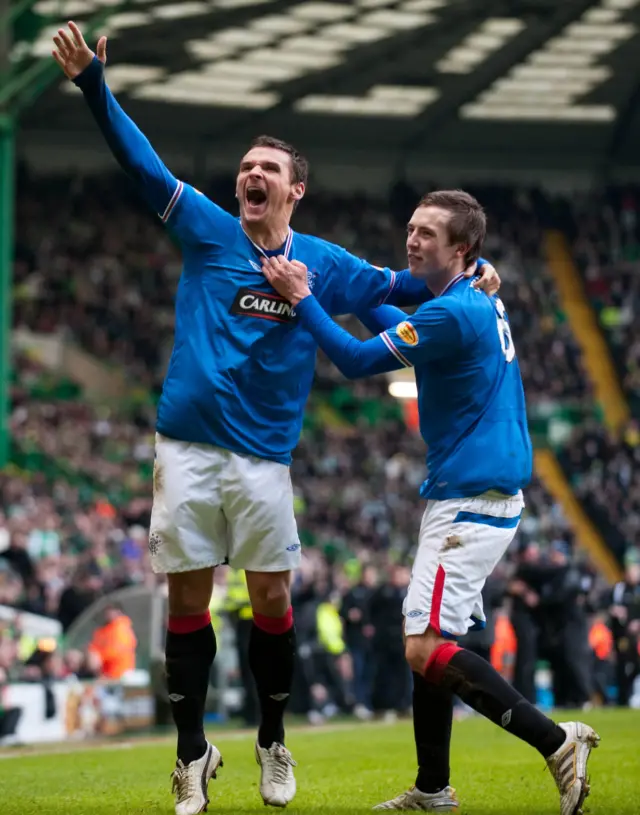 Lee McCulloch celebrates scoring in an Old Firm derby