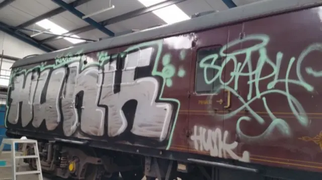 One of the vandalised train carriages