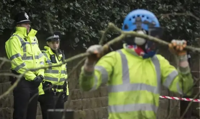 Police at tree felling site