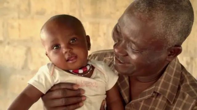 Diop and his granddaughter