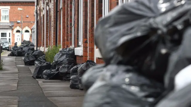 Bin bags outside houses