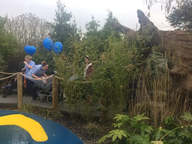 St Andrew's Hospice staff and users in new garden