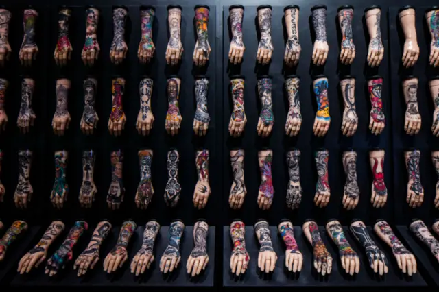 100 tattood arms on display in museum