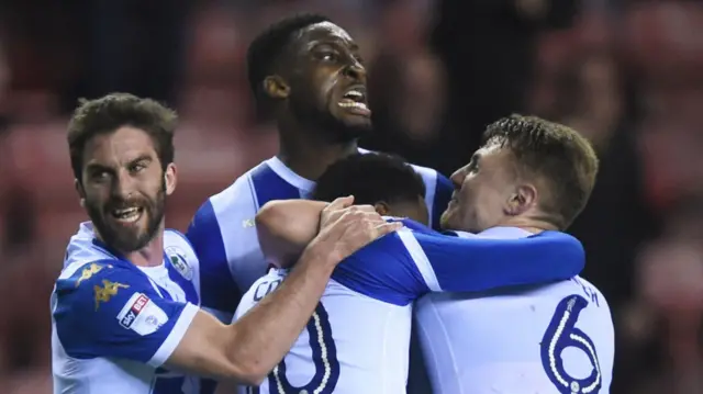 Wigan celebrate a goal