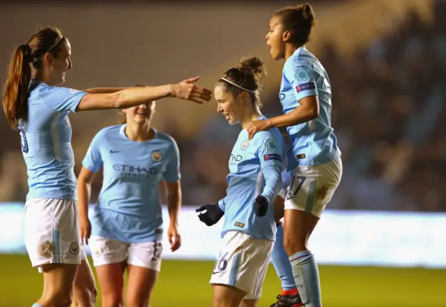 Jane Ross of Manchester City Women celebrates with Jill Scott and Nikita Parris