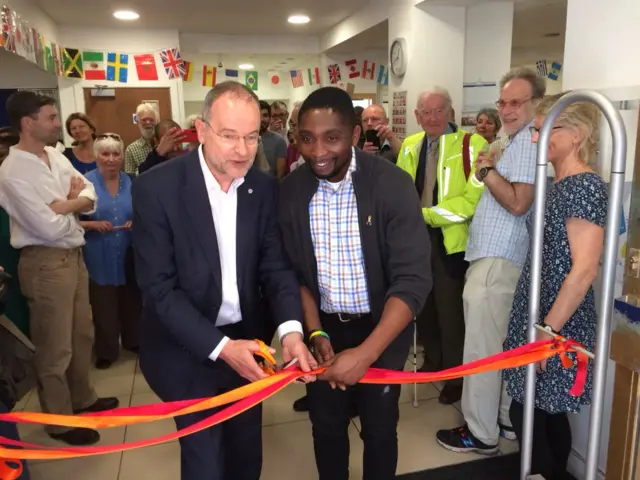 MP Paul Blomfield and Charles Obiri cut the ribbon