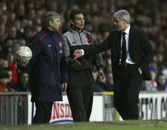 Arsene Wenger and Mark Hughes