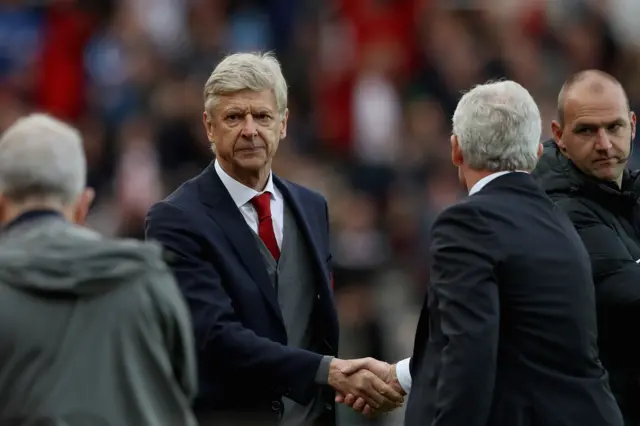 Arsene Wenger and Mark Hughes