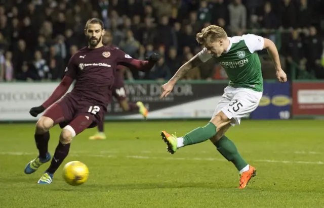 Jason Cummings scores for Hibs in a 3-1 Scottish Cup replay win over Hearts