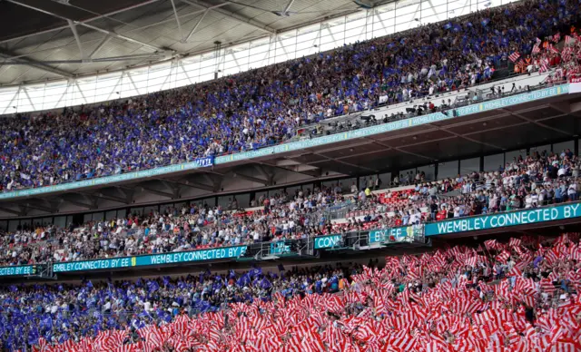 Chelsea and Southampton fans wave flags during the FA Cup semi-final