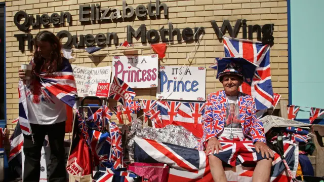 Fans outside the hospital