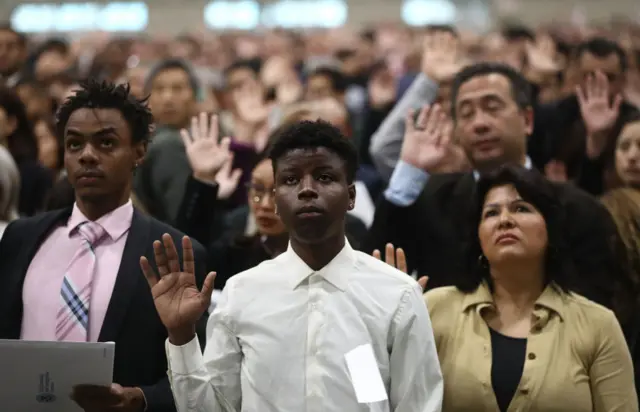 Thousands Of Immigrants Are Naturalized In Citizenship Ceremony At L.A. Convention Center in March 2018.