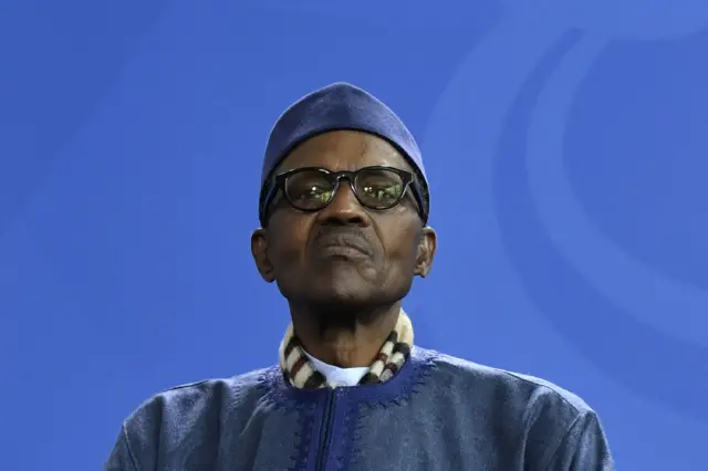 A photo taken on October 14, 2016 shows Nigeria's President Muhammadu Buhari attending a joint press conference with the German Chancellor at the Chancellery in Berlin.