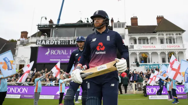 Jonny Bairstow and Alex Hales walk out to bat