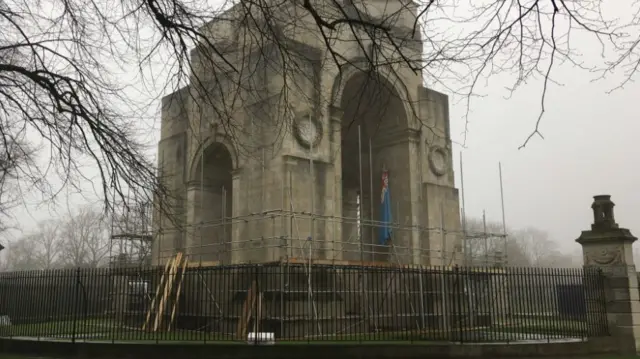 War memorial covered in scaffolding