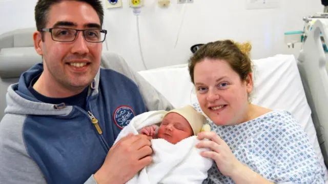 Laura and Scott with newly-born Jacob