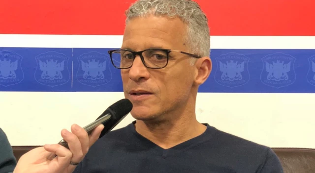 Keith Curle at news conference