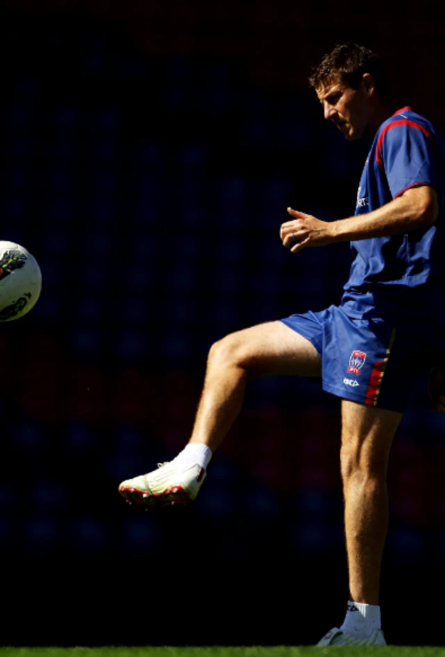 Michael Bridges in Newcastle Jets strip