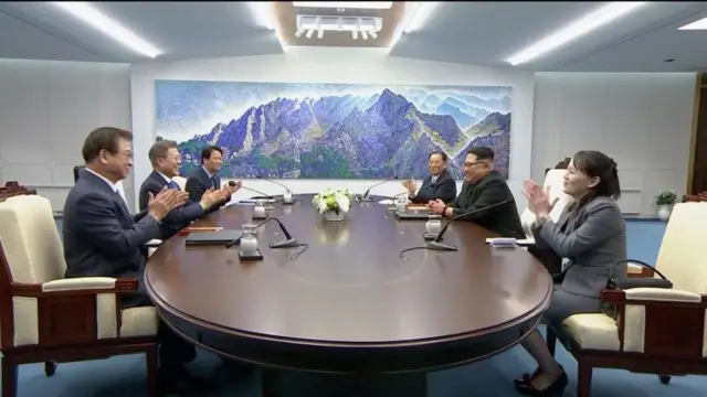 Korean delegations at meeting table