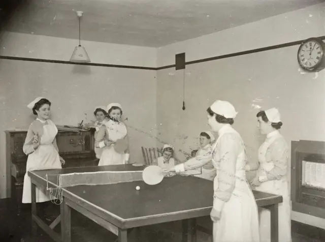 nurses playing table tennis