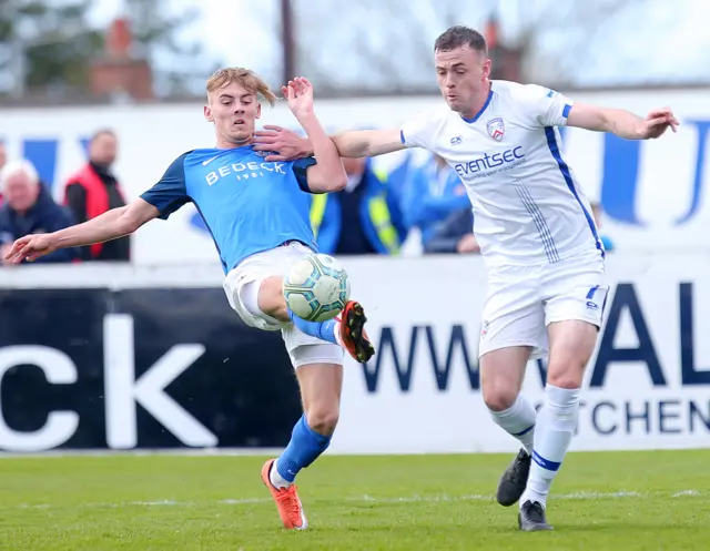 Glenavon's Mark Sykes in action against Coleraine's Darren McCauley