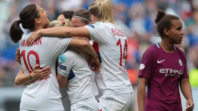 Lyon celebrate their goal against Man City Women